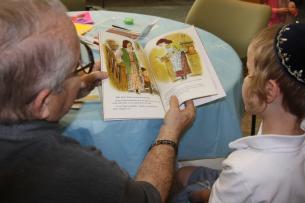 Old and Young Enjoy a Holiday Story