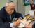 Signing books, photo by Jeffrey Foote